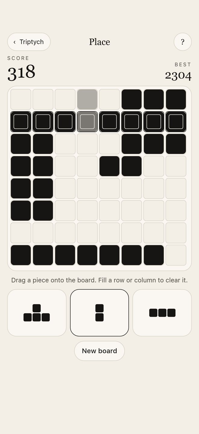 Place: an 8×8 board of black ink blocks with three pieces in the tray